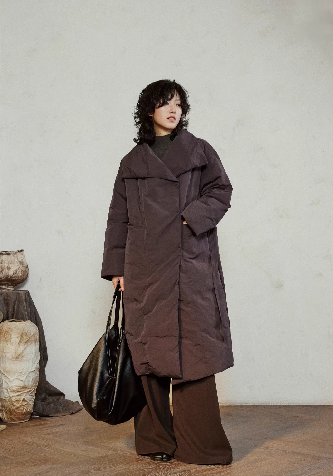 Doudoune longue ceinturée femme