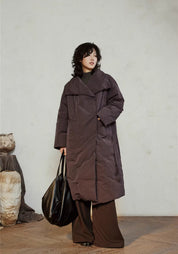 Doudoune longue ceinturée femme