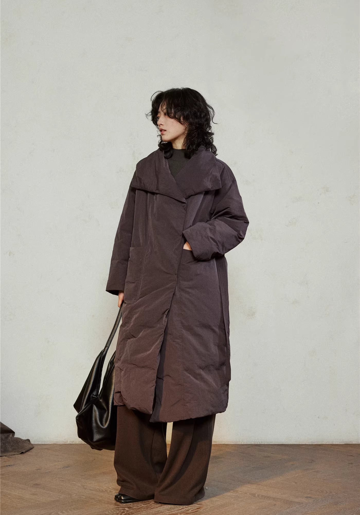 Doudoune longue ceinturée femme