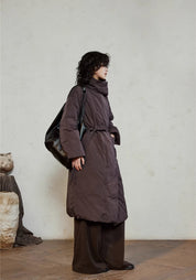 Doudoune longue ceinturée femme