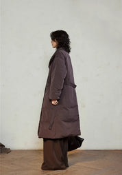 Doudoune longue ceinturée femme