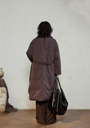 Doudoune longue ceinturée femme