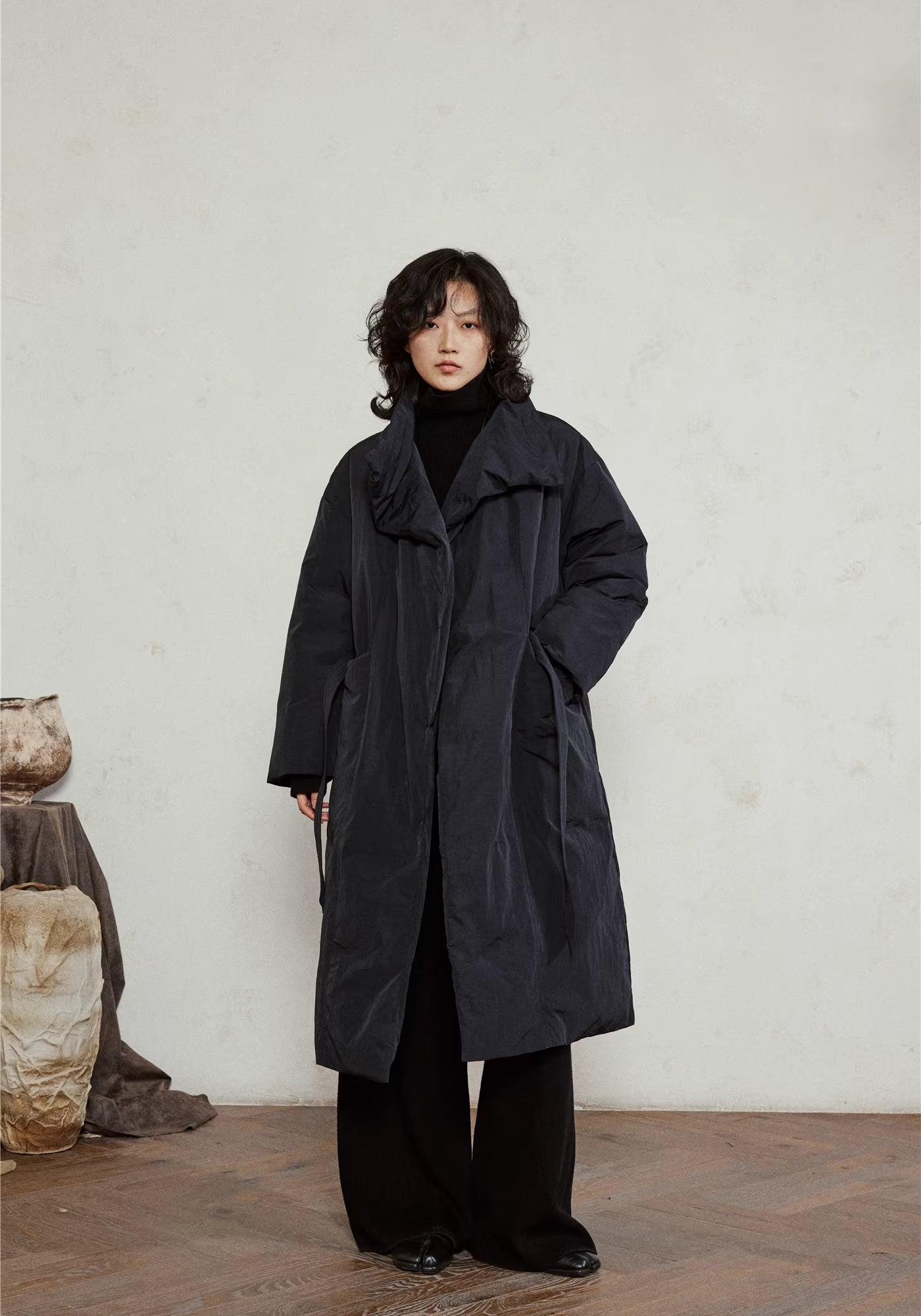 Doudoune longue ceinturée femme