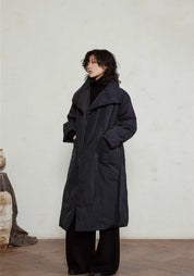 Doudoune longue ceinturée femme